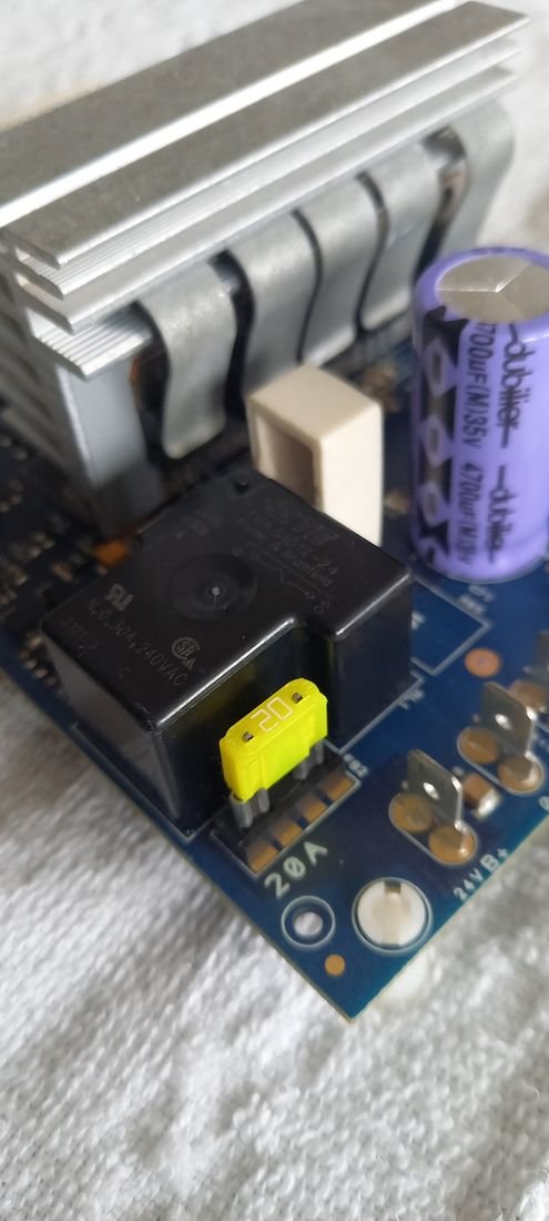 The original mechanical relay on a stairlift control board